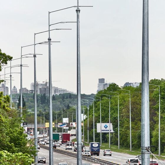 Multifaceted lighting poles